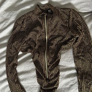 Dolls kill sparkle long sleeve cut out back onsie